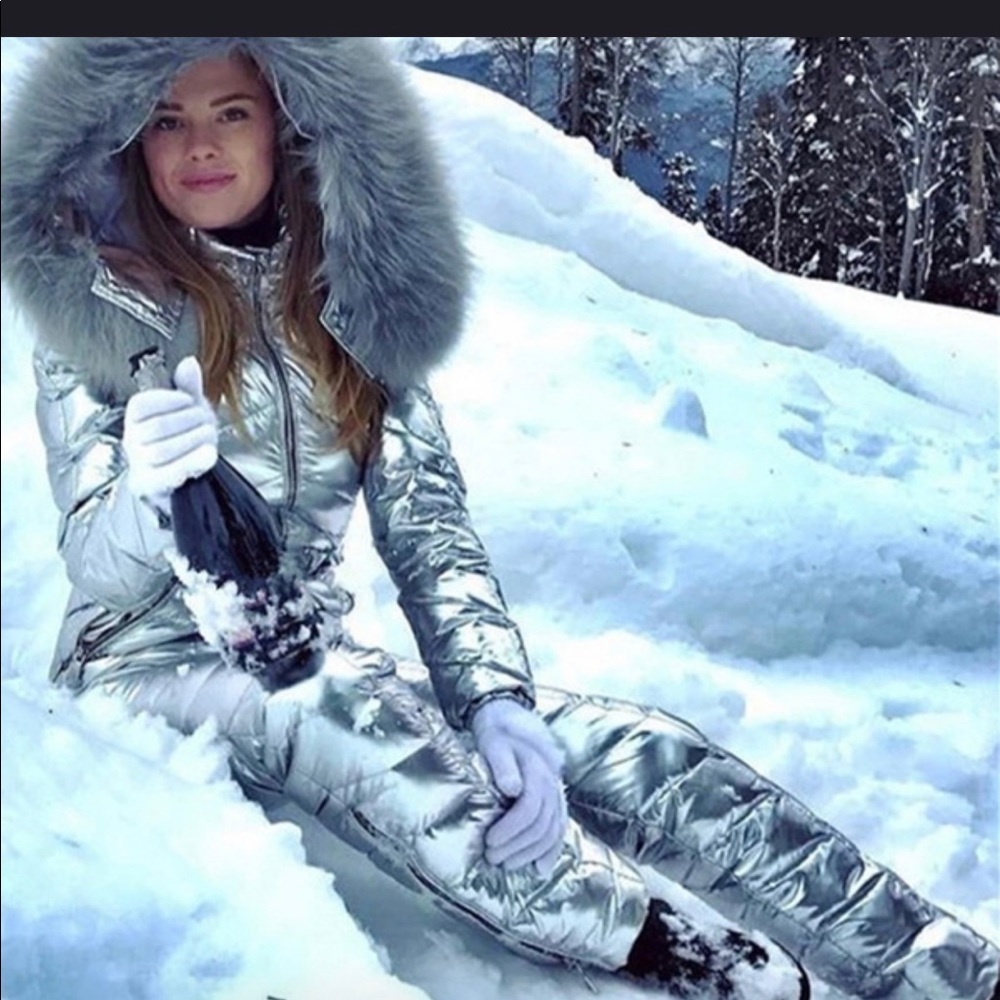 Ski suit silver. new never used. Warm and stylish